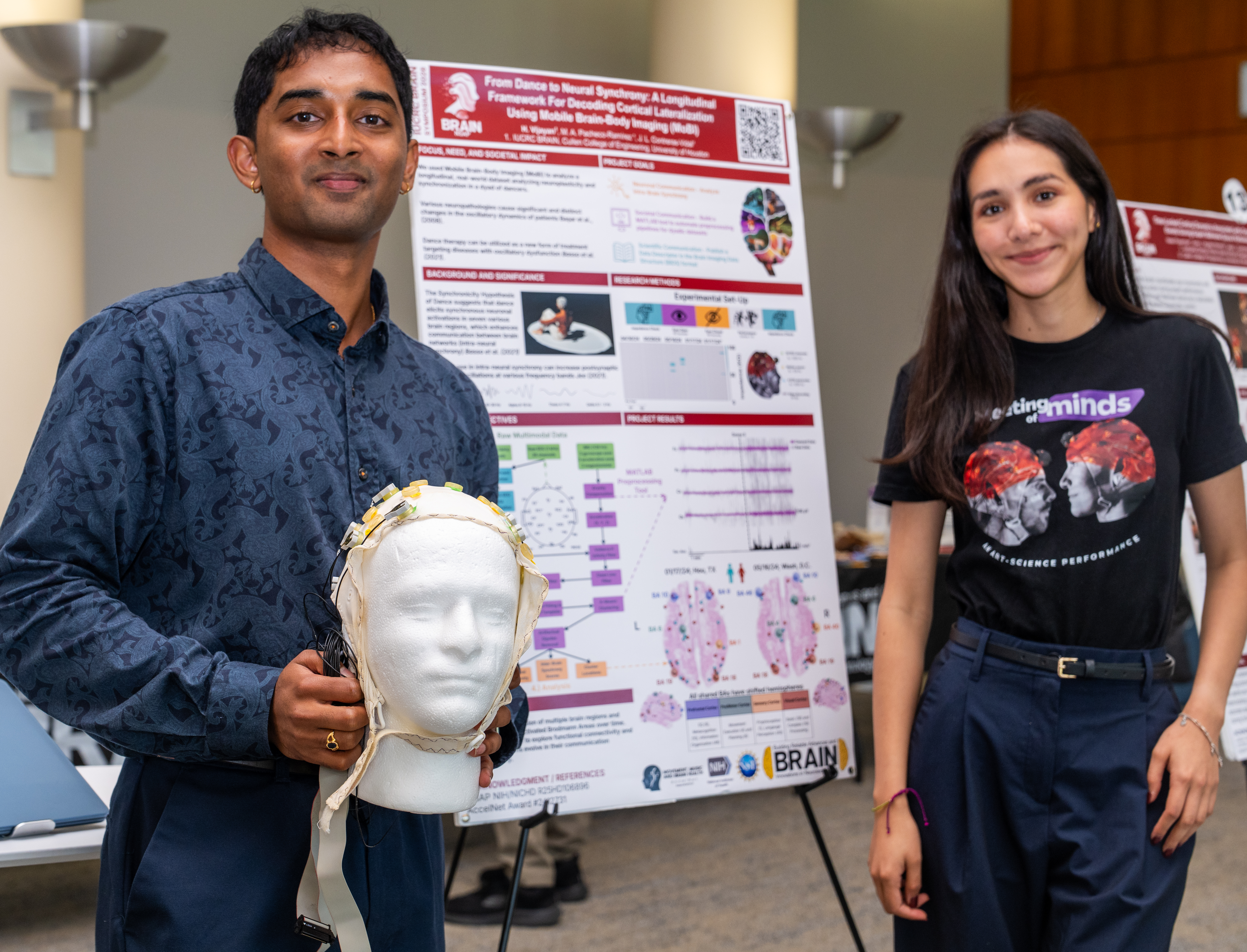 Harshil Vijayan and Maxine Annel Pacheco-Ramírez presenting the Meeting of Minds poster at the IUCRC BRAIN Symposium
